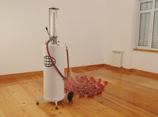 The Drain, 2007, Petrol pump, blood bags, oil and vinyl sticker, 180 x 100 x 200 cm