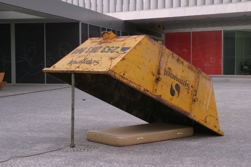 Clandestines, 2010/2011, Waste container, iron pipe, mattress and rope; Variable dimensions (container dim. 120 x 400 x 180 cm)